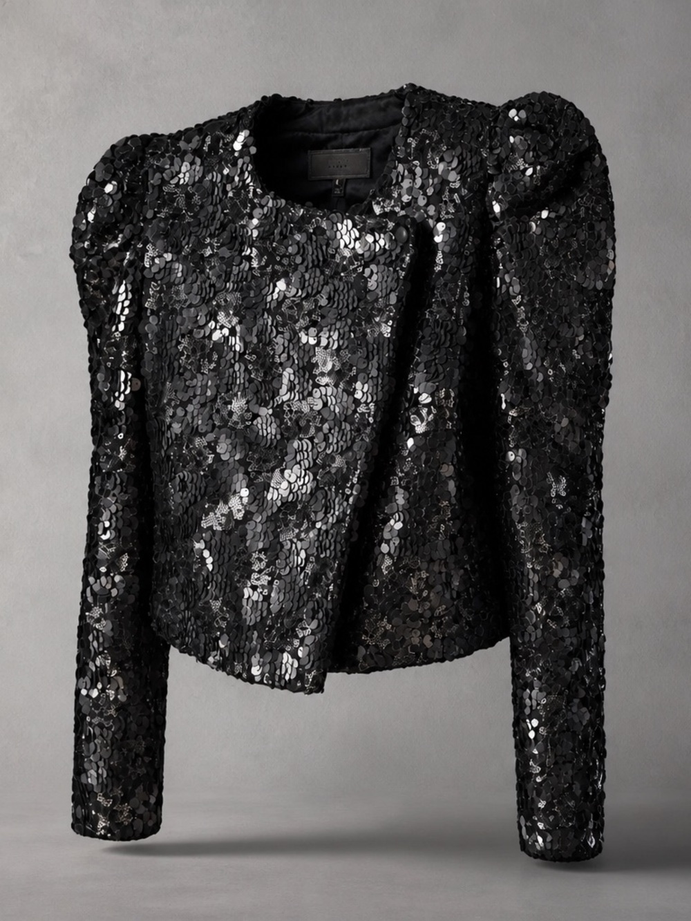 Sequin and paillettes black puff shoulder jacket.